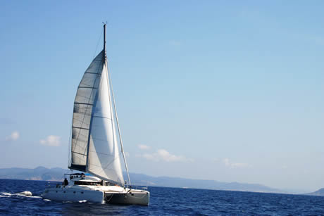 Catamaran in regatta near ibiza photo