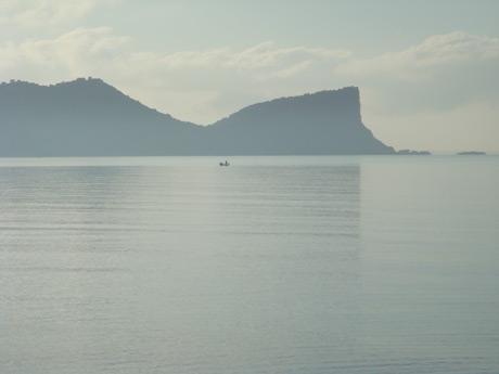 Small boat on the sea ibiza photo